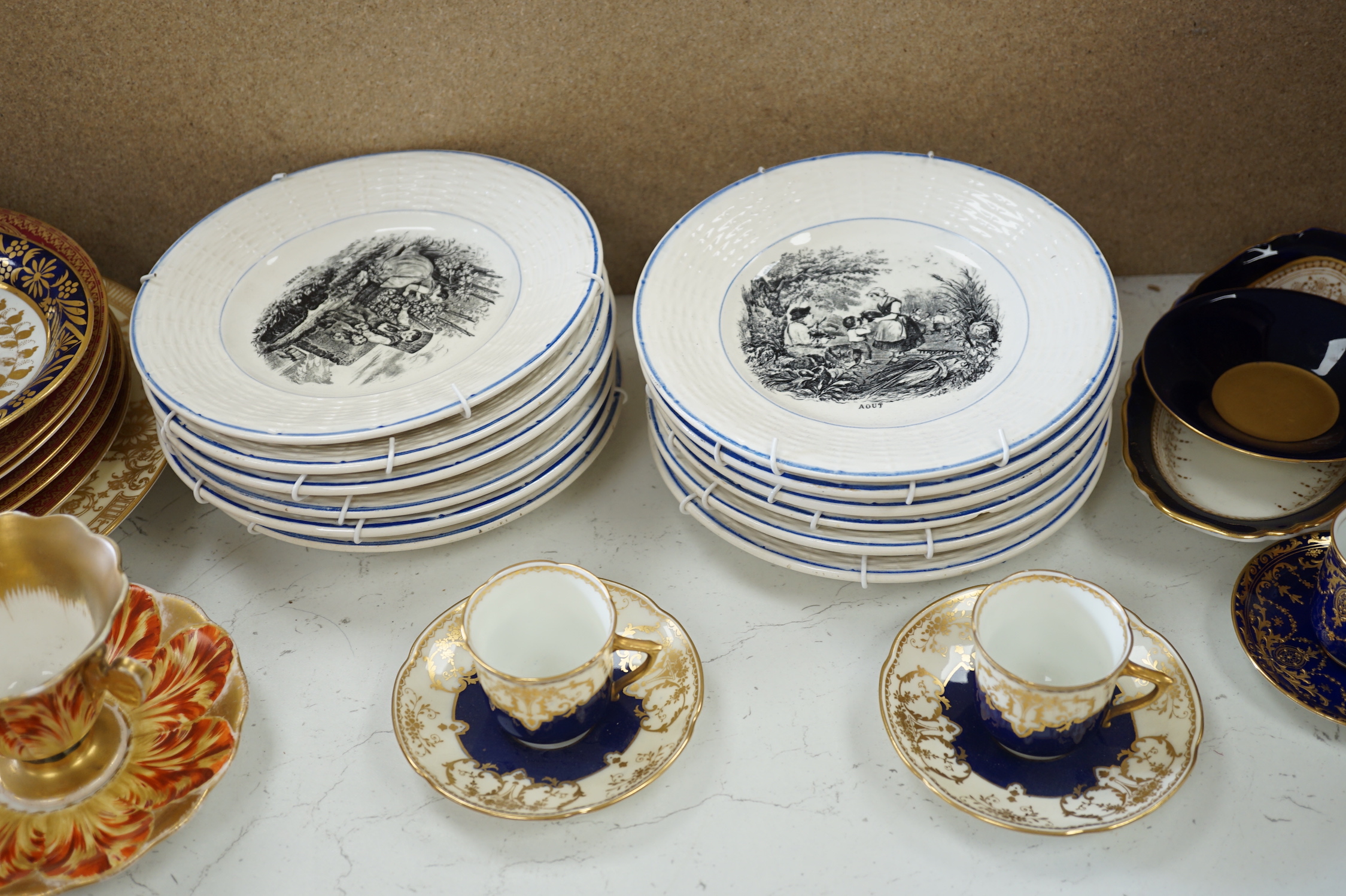 A Spode ‘tulip’ cup and saucer, a set of Sarreguemines month plates and collection of Worcester